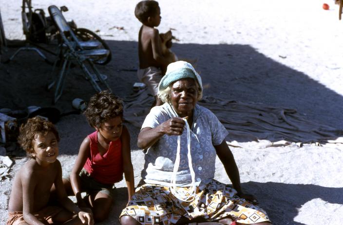 Image of a woman and children